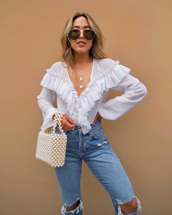Deep V-Necked White Blouse + Ripped Jeans