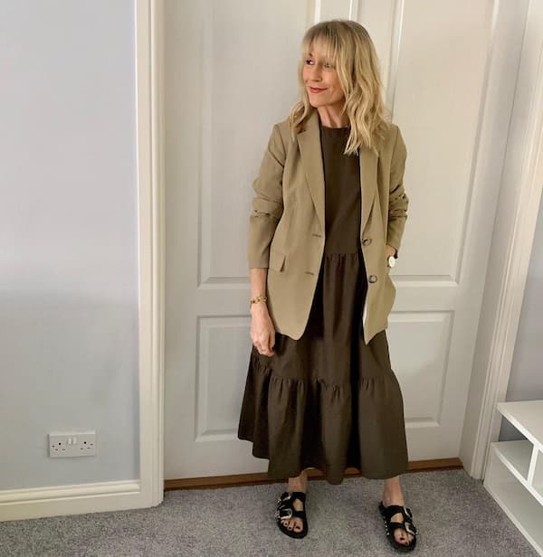 Khaki Blazer + Neutral Coloured Gown + Flat Footwear + Wristwatch