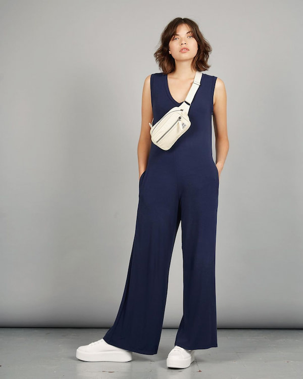 Atlanta Jumpsuit with Pocket and White Trainers + Bag