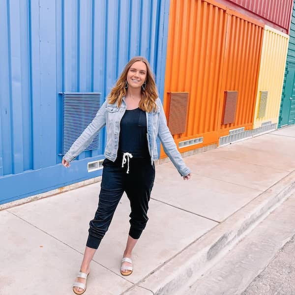 Black Sleeveless Jumpsuit with Denim Jacket and Slide Sandals