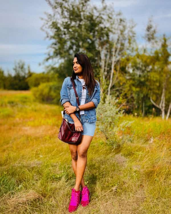 White Inner Top + Denim Jacket and Shorts + Sneakers + Hand Bag