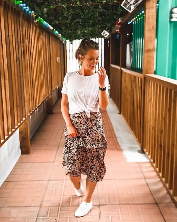 White Tee with Floral Midi Skirt and Sneakers