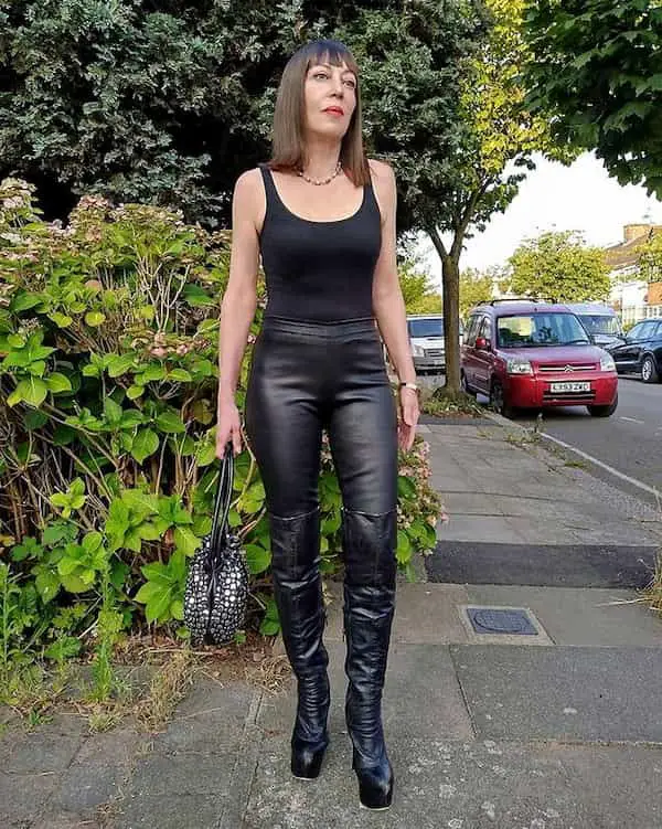 Black Tank Top + Leather Pants + Knee High Leather Boots + Handbag