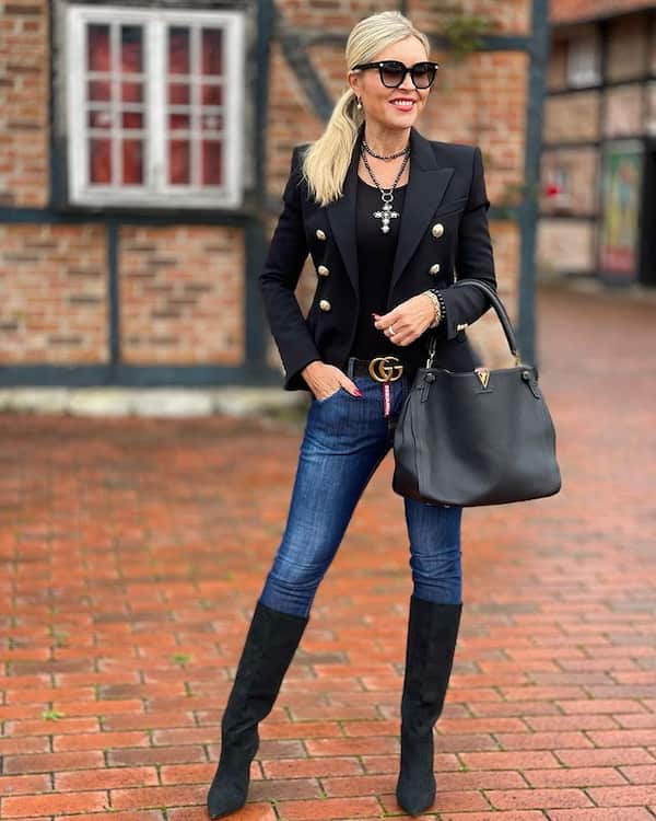 Black Blazer with Black Top + Jeans + Knee-length Boots + Handbag + Gucci Belt + Sunglasses