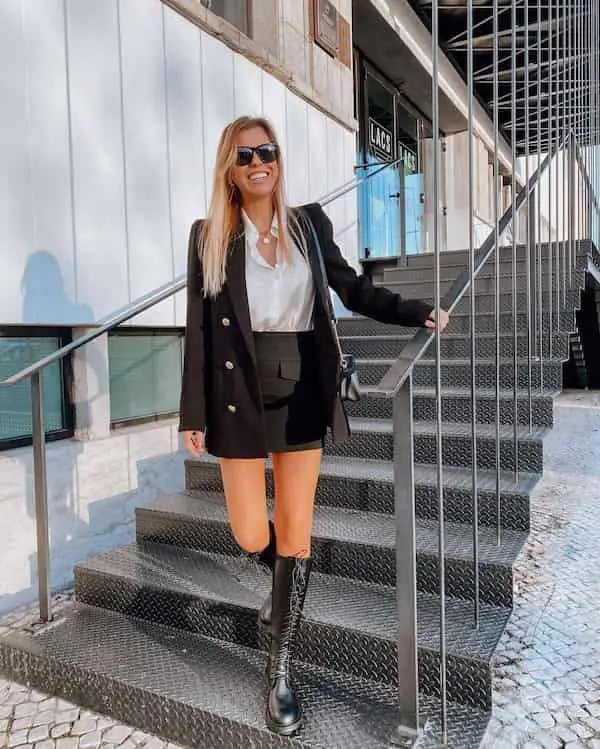 Black Blazer with Button-down White Shirt + Mini Skirt + Knee-High Boots + Sunglasses