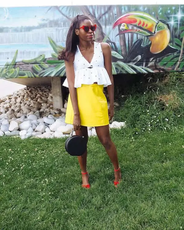 White Peplum Crop Top + Yellow Short Leather Skirt + Red Heels + Handbag