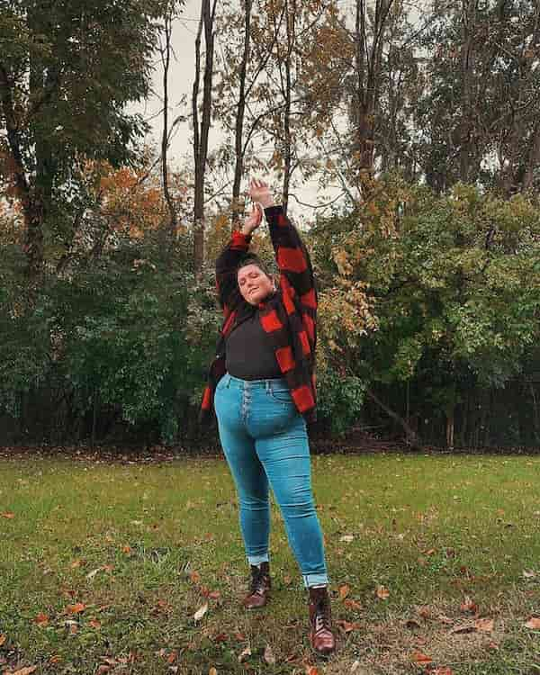 Black Shirt + Oversized Flannel + High Waist Blue Jeans + Boots