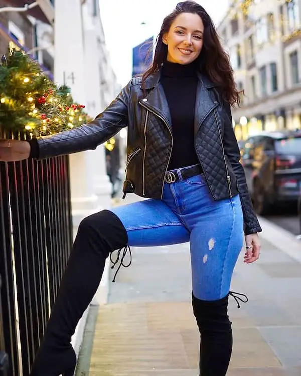 Black Top + Leather Jacket + Blue Jeans + Thigh Boots