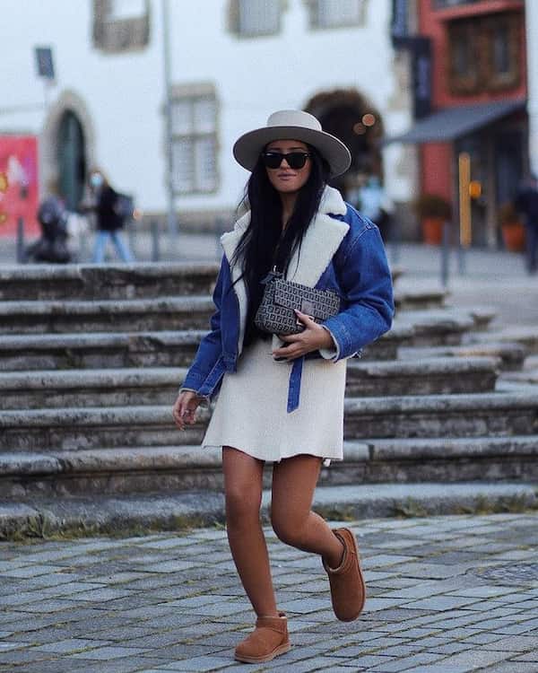 Black Vest + Winter Coat + Ankle - High Ugg Boots + English Hat + Sunglasses + Handbag