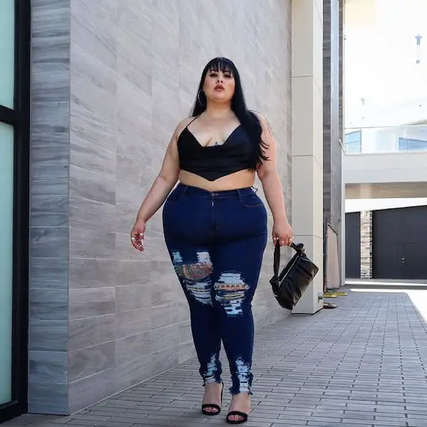 Cropped Top + Ripped Blue Jeans + Heels + Handbag