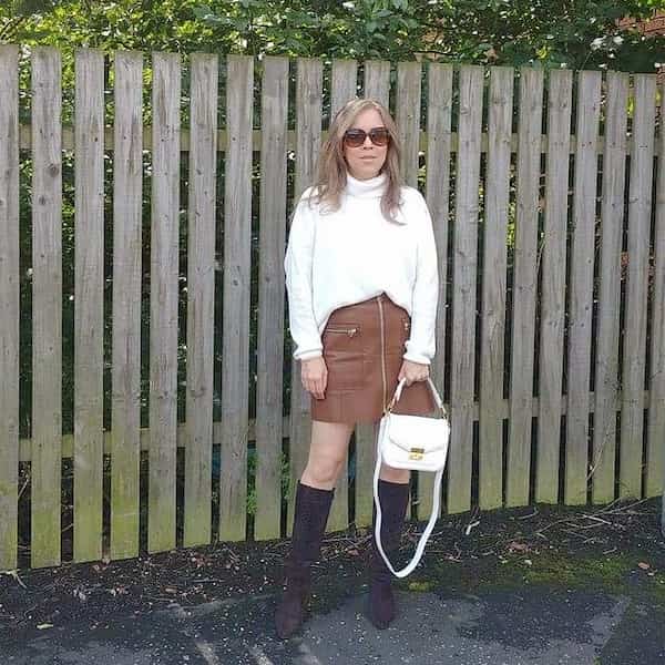 White Long Sleeve Shirt + Mini Leather Skirt + Knee-high Boots + Handbag+ Sunglasses