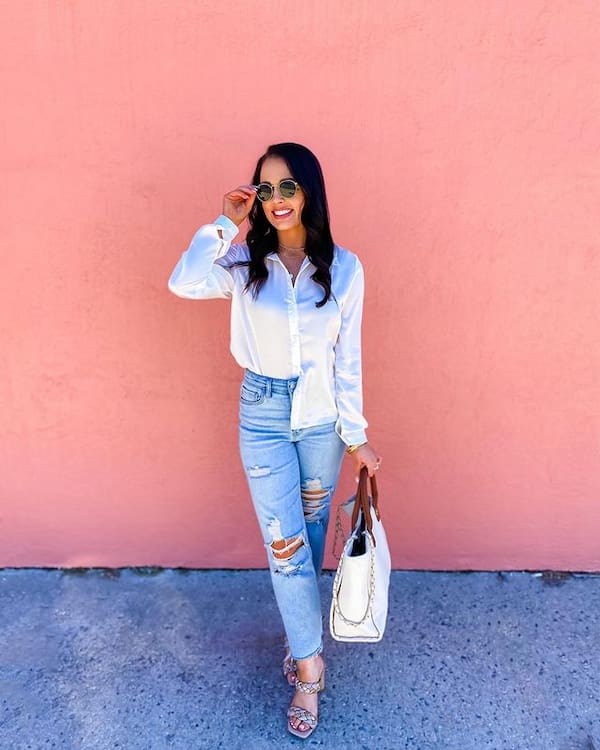 Button Front White Shirt + Ripped Blue Jeans + Heels + Handbag + Sunglasses