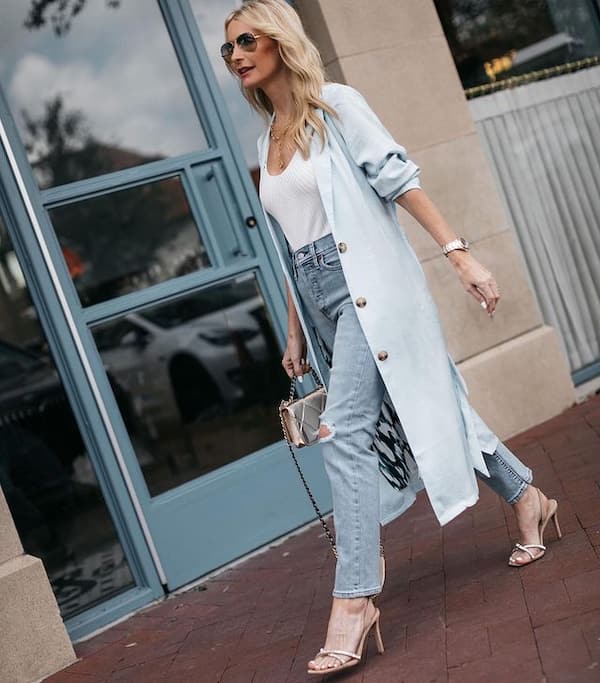 White Vest + Distressed Jeans + Trench Coat + Heels + Midi Handbag + Sunglasses