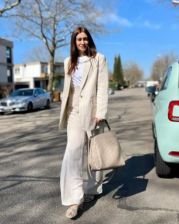 Beige Trouser Suit + White T-shirt + Large Pouch Bag + Sandals