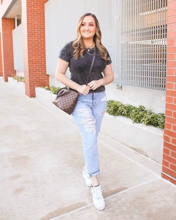 Black Blouse with Ripped Jeans + Sneakers + Cross Shoulder Handbag