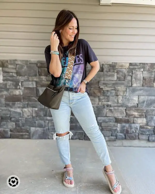 Black Graphic Top with Ripped Jean Pants + Sandals + Cross Shoulder Bag