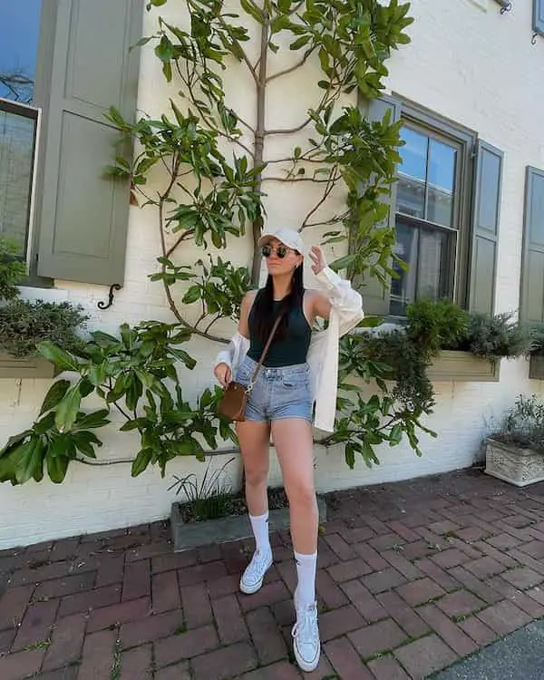 Black Tank Top with Off – white Jacket + Denim Shorts + Sneakers + Crossbody Bag + Face Cap + Sunglasses