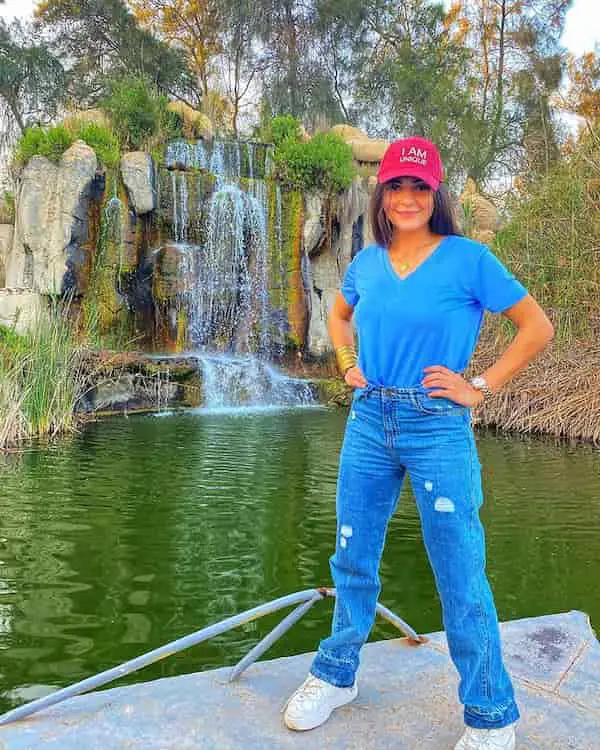 Blue Top with Jean Pants + Sneakers + Face Cap