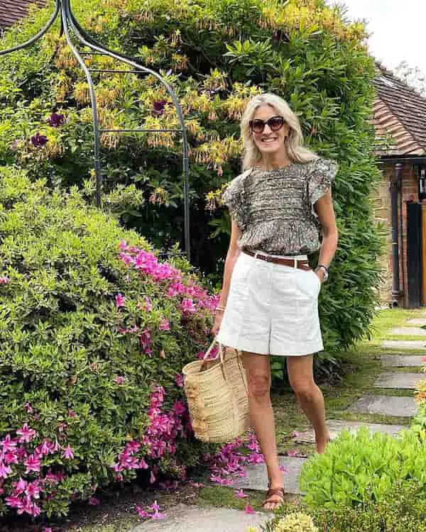 Floral Blouse with White Loose Fitted Shorts + Sandals + Maxi Handbag + Sunglasses