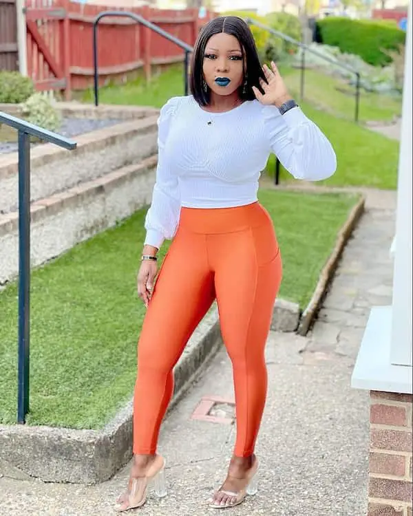 White Long Sleeve Top with High Waist Orange Leggings + Heels