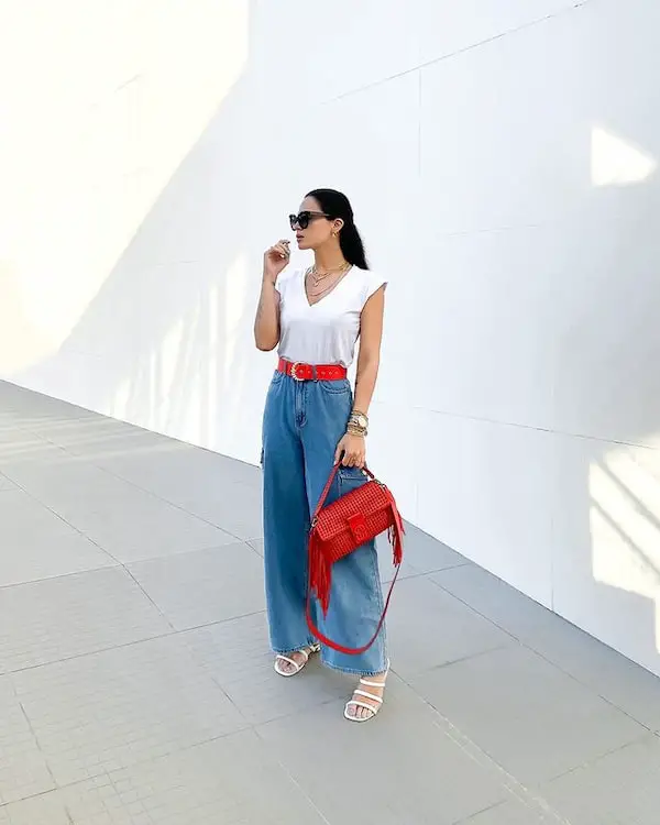 White Top with Red Belt + Baggy Jean Pants + Heels + Midi Handbag + Sunglasses