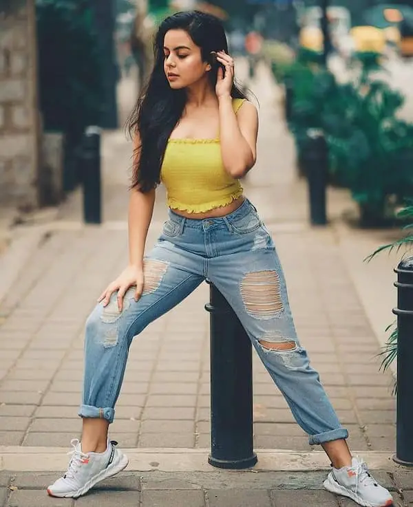 Yellow Crop Top with Ripped Jean Pants + Sneakers