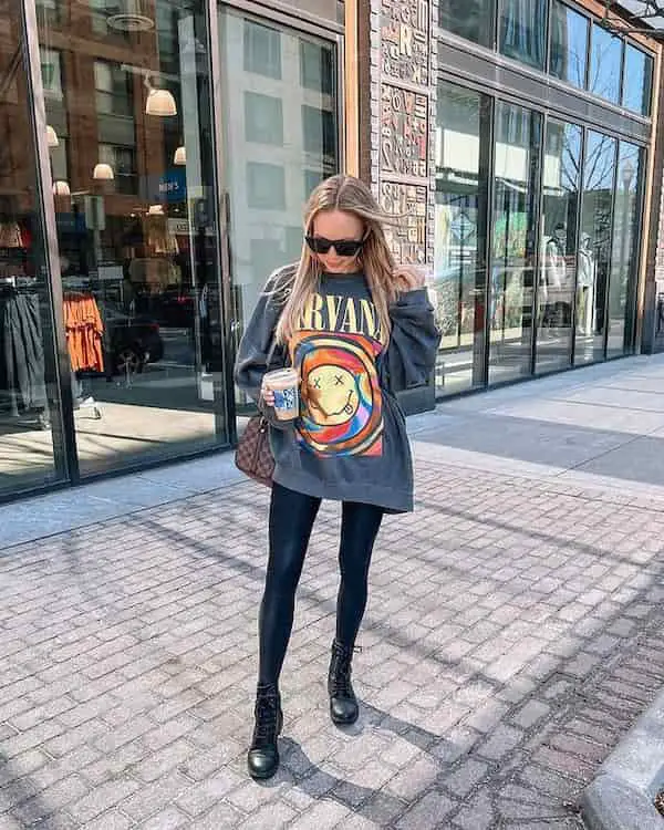 Black Combat Boots and Leggings with Ash Graphic Oversized Sweater + Brown Handbag + Sunglasses