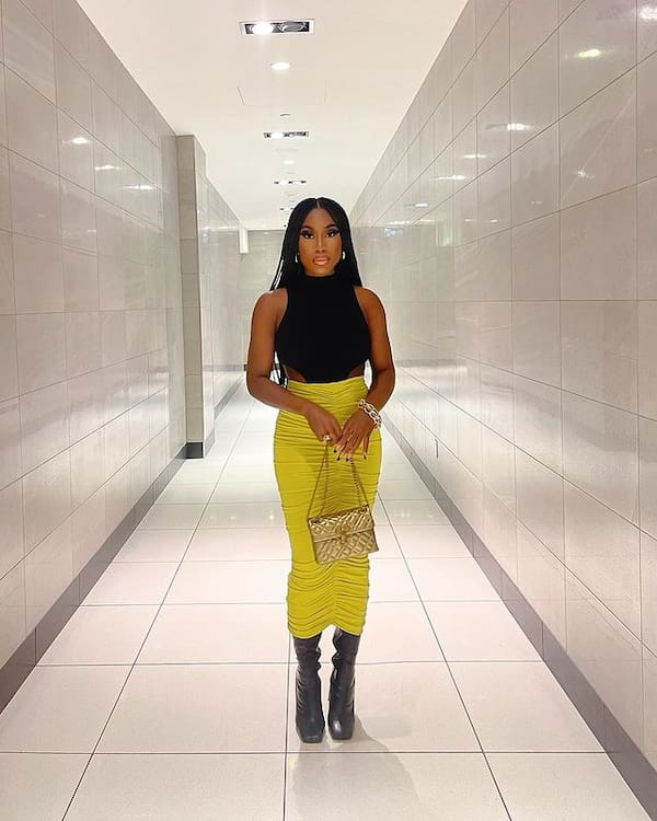 Black Tank Top with Yellow High Waist Skirt + Boots + Handbag