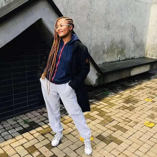 Blue Hoodie with Black Jacket + White Oversized Pants + Sneakers + Sunglasses