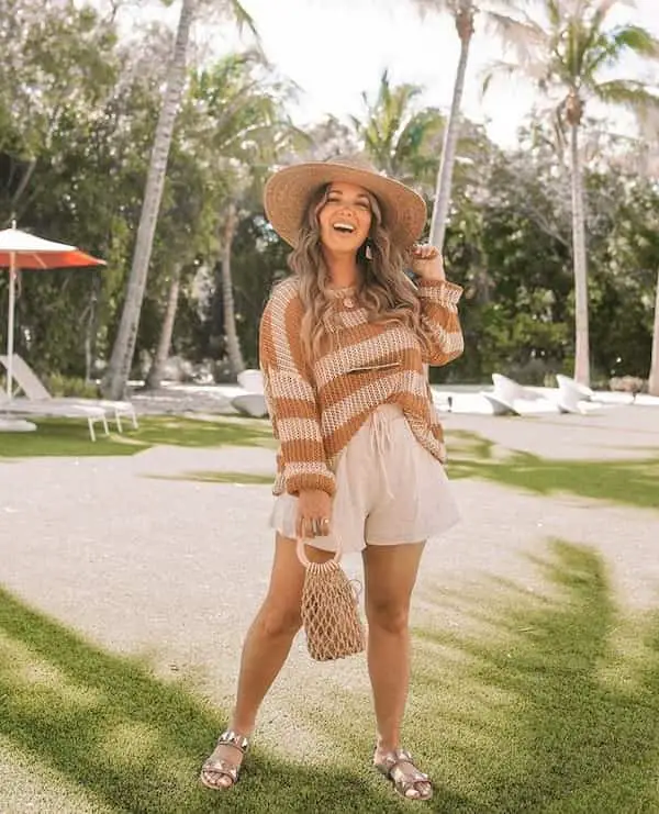Camel Striped Open Knit Sweater with White Shorts + Sandals + Hat + Handbag