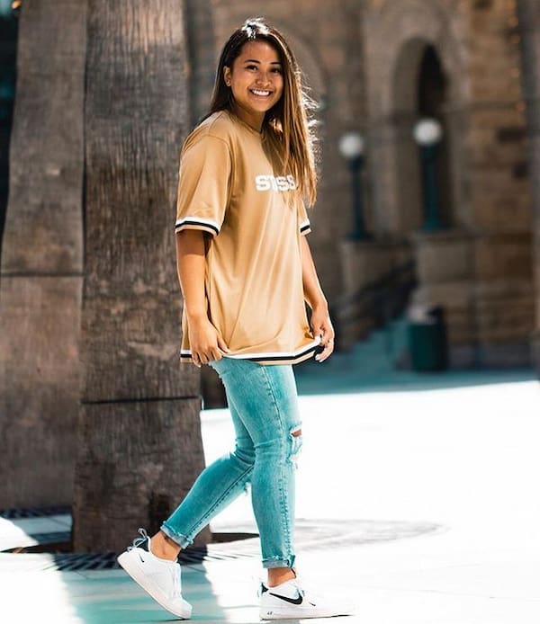 Peach Graphic T-Shirt with Ripped Jeans + Sneakers