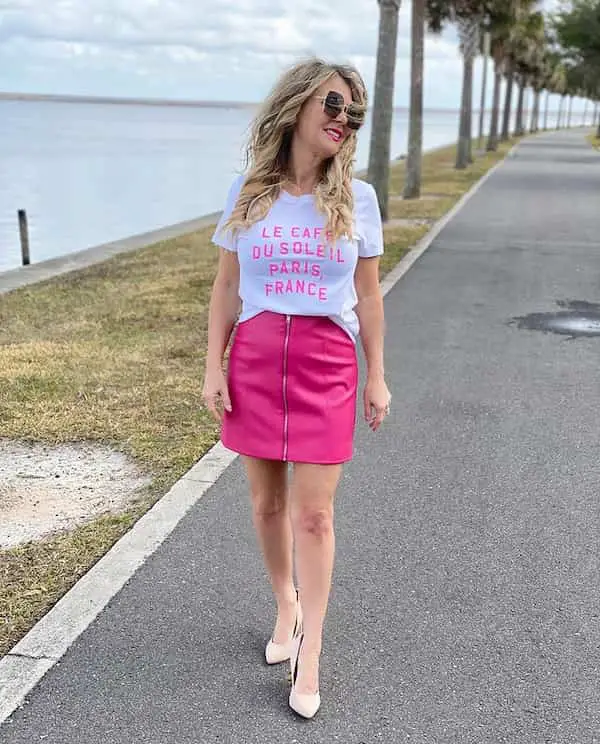 Pink Faux Leather Skirt with White Graphic Top + Brown Heels + Sunglasses