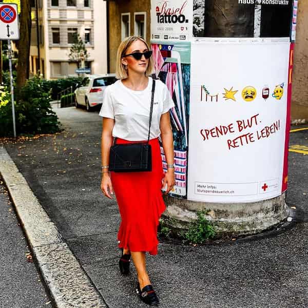 Red Down Stepped Midi Skirt with White Shirt + Black Loafers + Black Handbag + Sunglasses