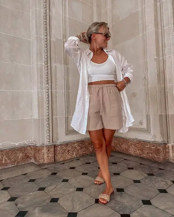 White Crop Top with brown Shorts + White Jacket + Slippers + Sunglasses