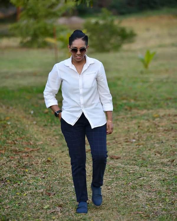White Long Sleeve Shirt with Blue Jeans + Sneakers + Sunglasses