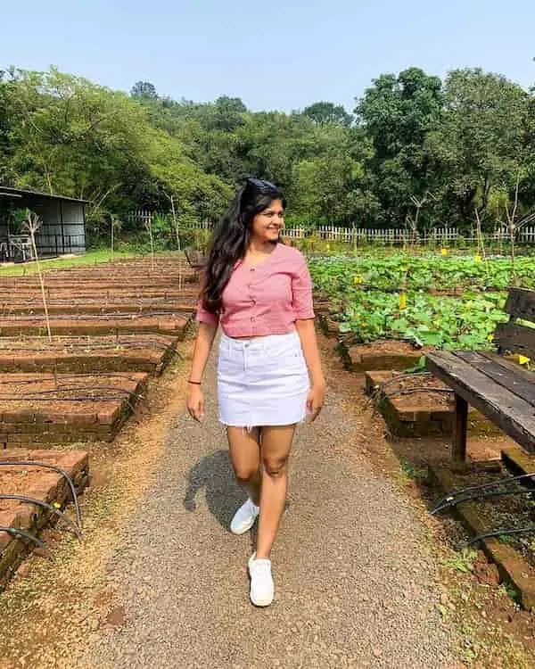 White Mini Denim Skirt with Pink Shirt + White Sneakers