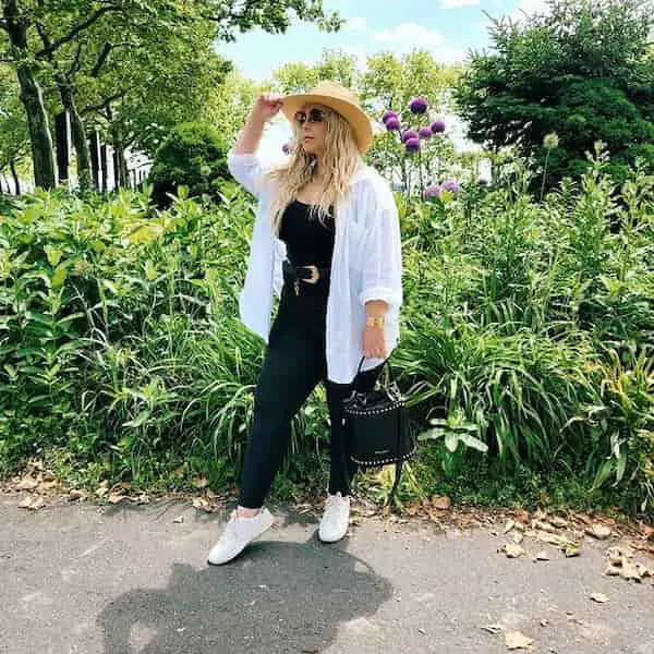 Black Leggings with Black Vest + White Oversized Shirt + Sneakers + Hat + Handbag + Sunglasses