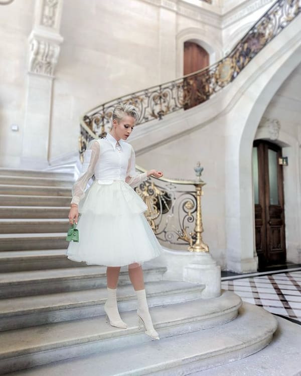 White Double Stepped Tulle Skirt with White Transparent Sleeve Shirt + Boots + Clutch Purse