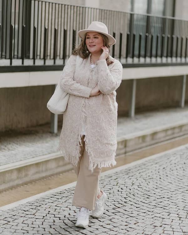 White Inner Top with Fur Jacket + Sand Colored Pants + Hat + Sneakers + Handbag