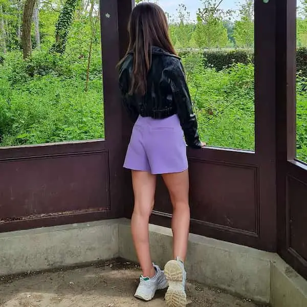 Black Leather Jacket with Purple Shorts and Chunky Sneakers
